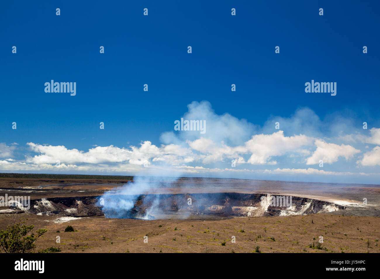 Volcanic steam rising from the crater of the active volcano Kilauea in the Hawaii Volcanoes
