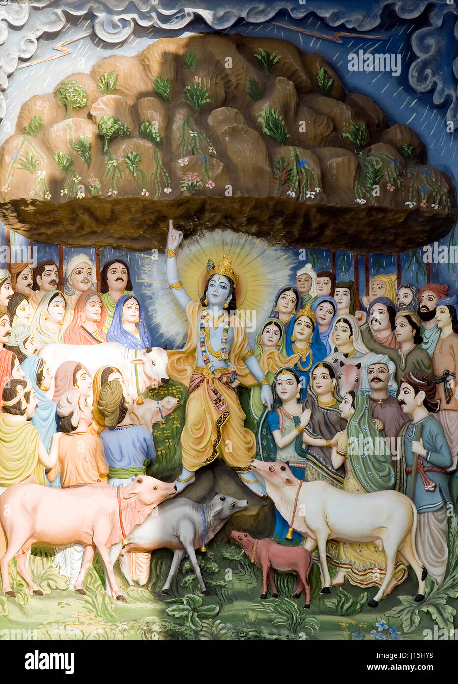 Lord Krishna lifting Govardhan parvat painting on wall, Uttar Pradesh, India, Asia Stock Photo