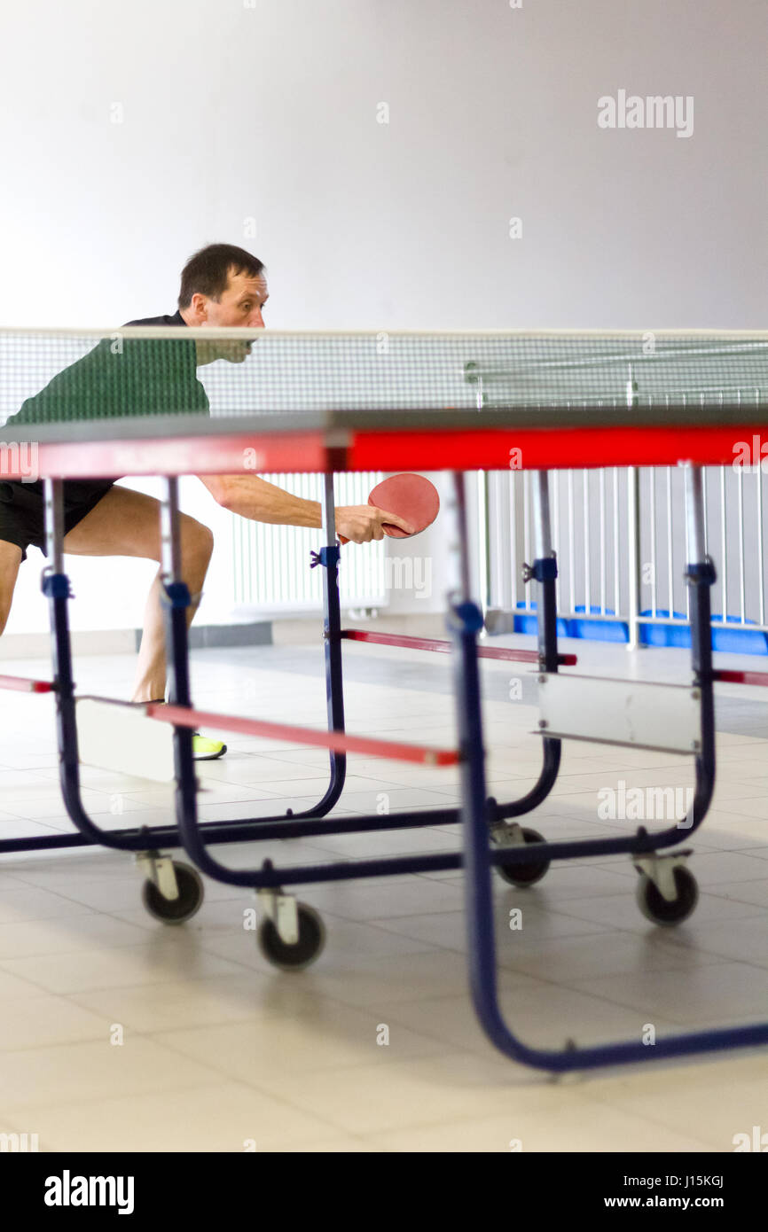 Male table tennis player playing backhand chop Stock Photo Alamy