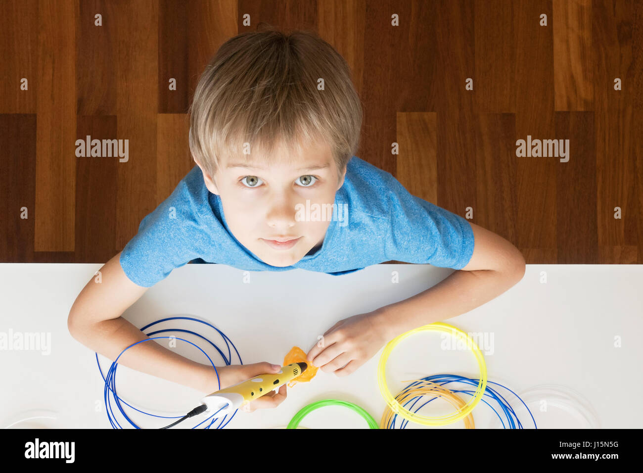 Child with 3D printing pen Stock Photo - Alamy