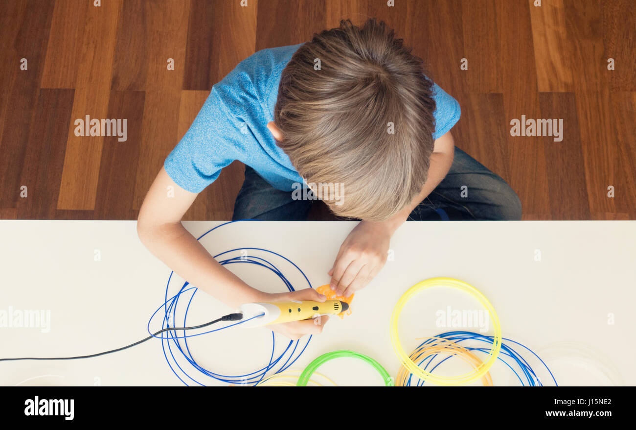 Child with 3D printing pen Stock Photo - Alamy
