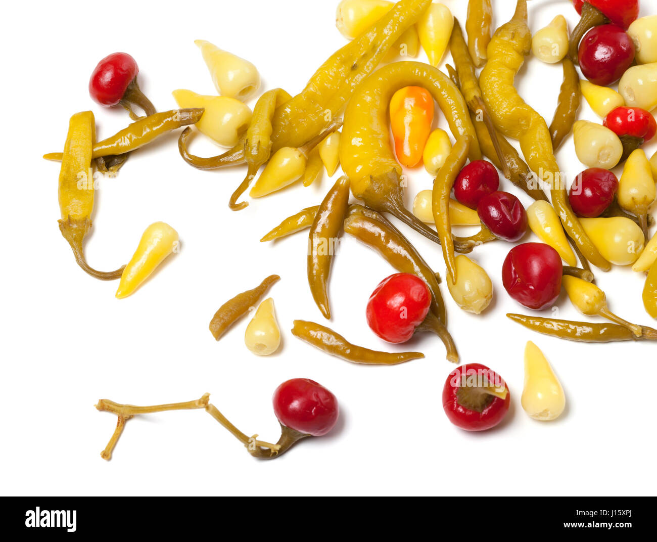 Mix of hot pickled peppers isolated on white background. Food