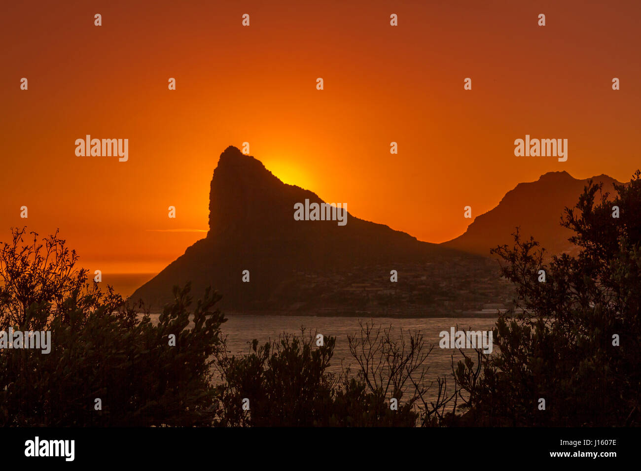 Sunset ,The Sentinel Rock and Hout Bay, Cape Town, South Africa Stock Photo