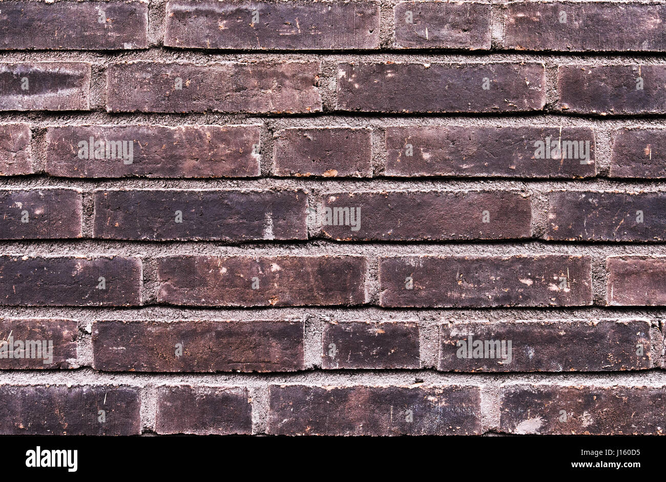 Weathered old building exterior brick wall background Stock Photo - Alamy