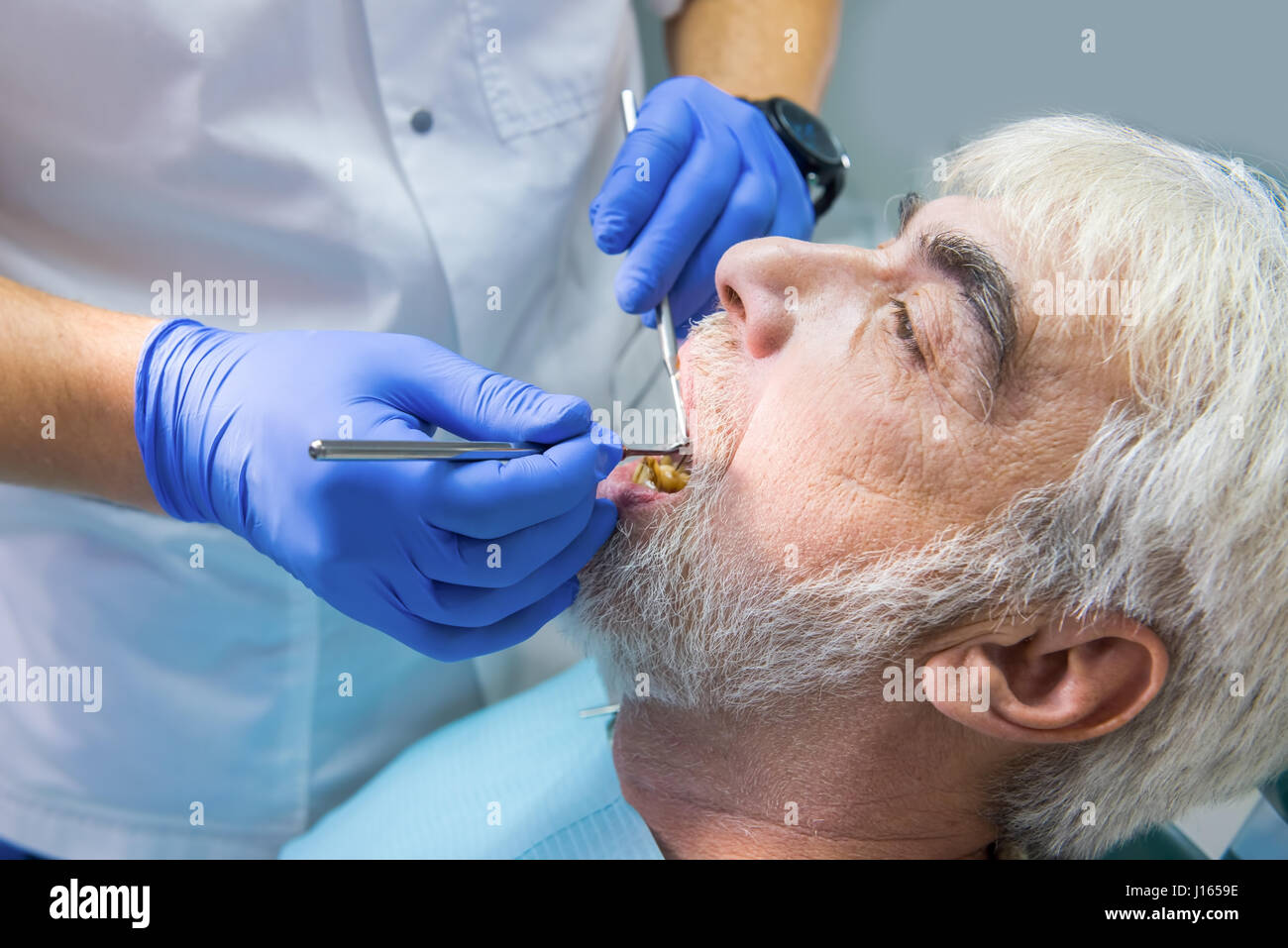 Procedure of dental examination. Doctor at work Stock Photo Alamy
