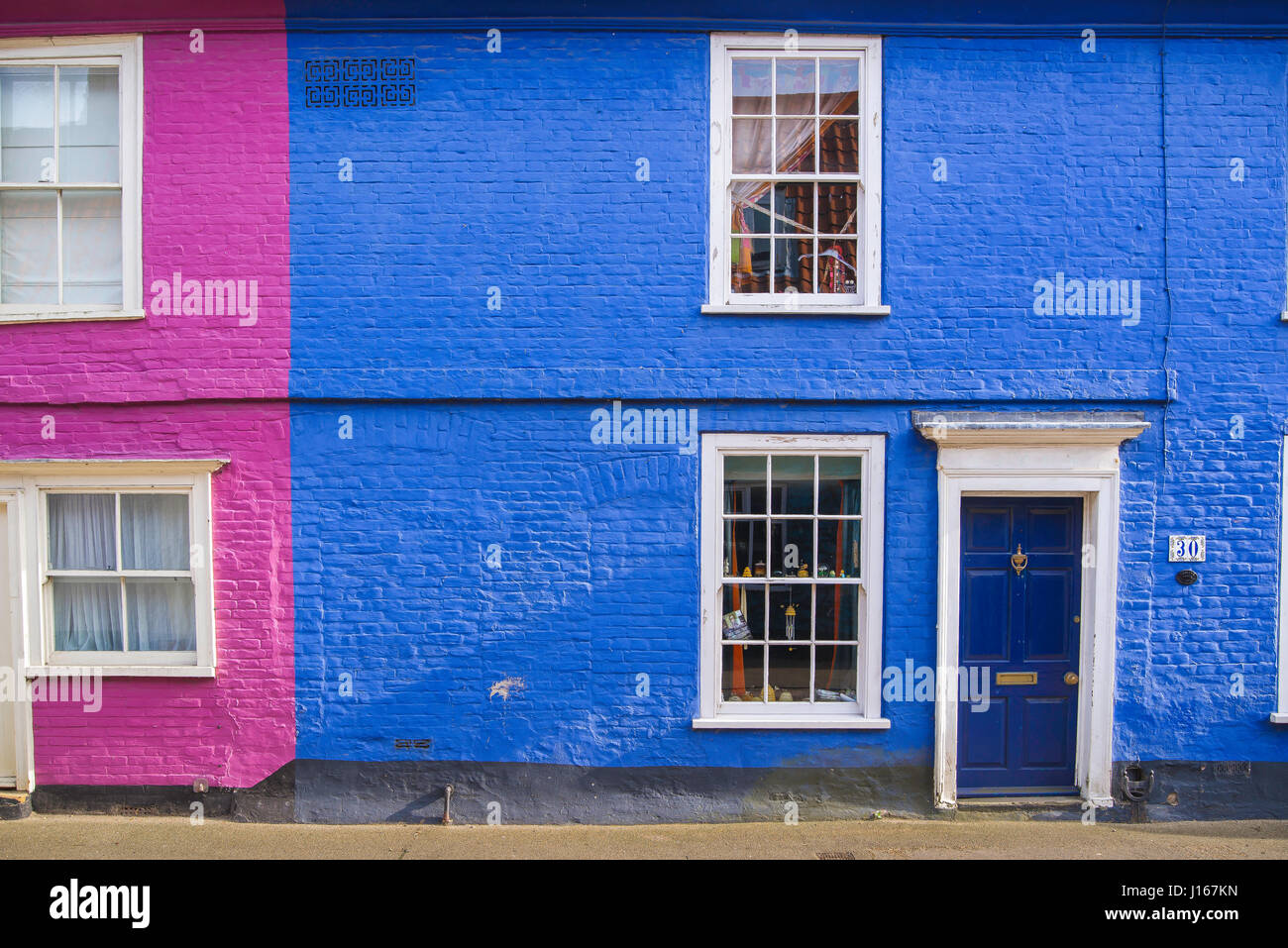 Colourful house, view of colorful terraced houses in Bridge Street in the centre of the Suffolk town of Bungay, England. Stock Photo