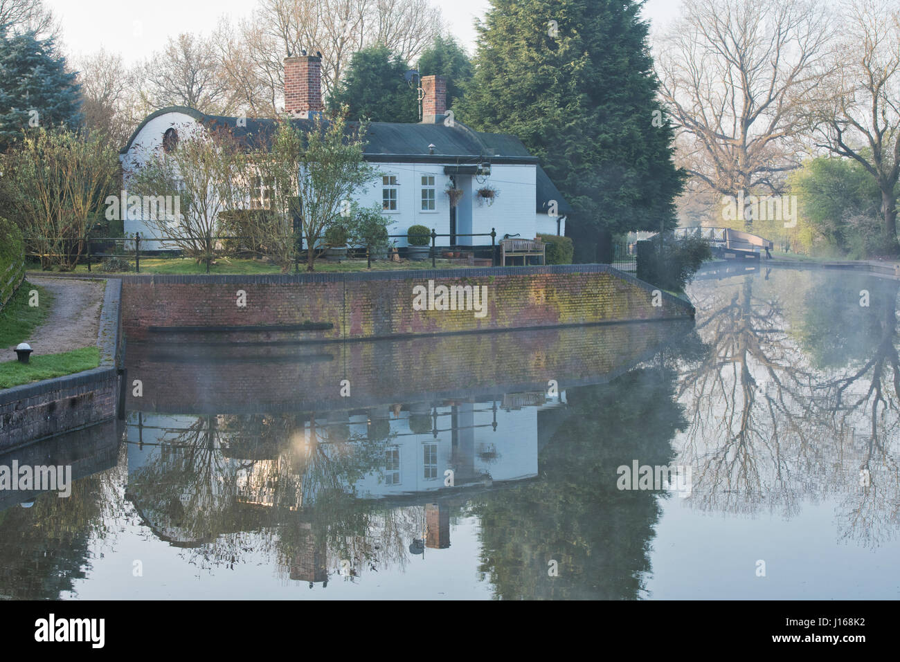 Lock keeper's cottage. Barrel roofed cottage at Lapworth on a misty
