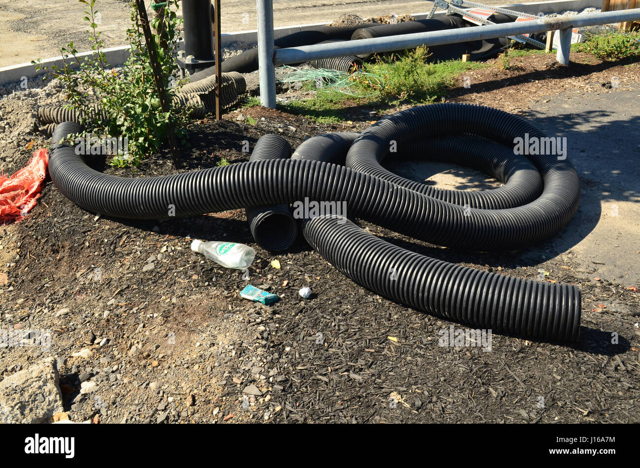 Flexible plastic pipe on construction site. Stock Photo