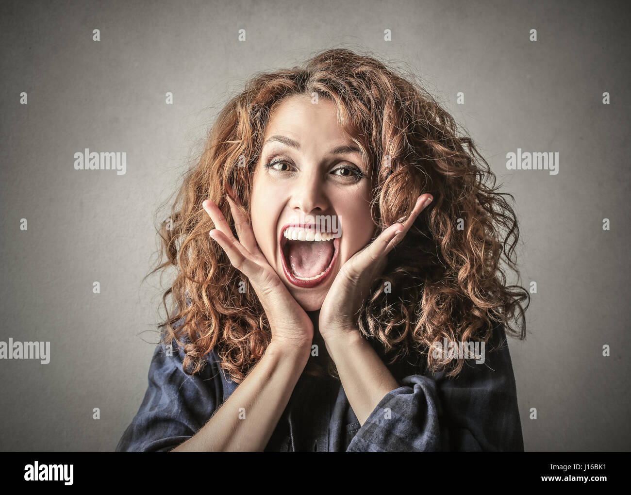 Brunette woman looking happy Stock Photo