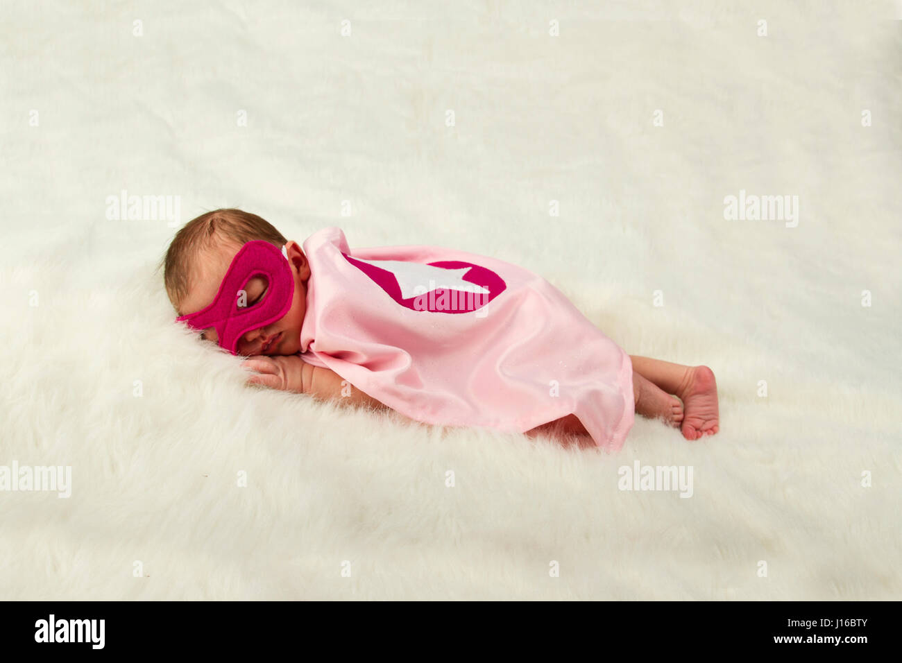 WASHINGTON STATE, USA: A pink version of Wonder Woman sleeps. IS IT A BIRD? Is it a plane? No, it’s a pint-sized Superman. From flying faster than a speeding bullet like Superman to web-slinging like your friendly neighbourhood Spiderman these cute baby pictures show mini-superheroes in all their glory. Complete with perfectly created capes, masks and superhero symbols the heart-melting shots of Batman, Batgirl, Superman, Captain America and Wonder Woman showcase the classic superheroes from DC and Marvel comics in the tiny form of babies. Superhero-fan and baby photographer Christy Peterson ( Stock Photo