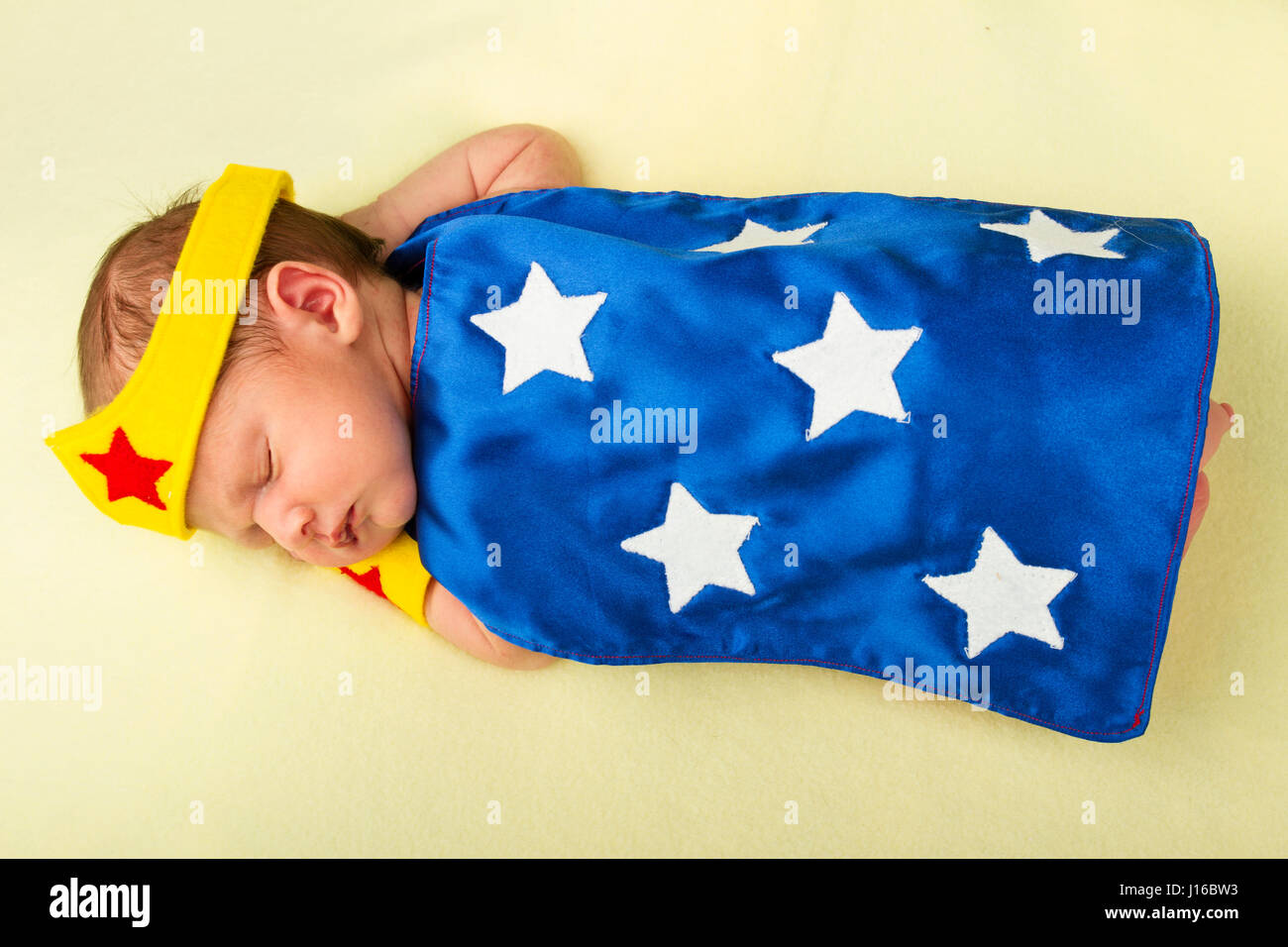 WASHINGTON STATE, USA: Baby Wonder Woman Sleeps. IS IT A BIRD? Is it a plane? No, it’s a pint-sized Superman. From flying faster than a speeding bullet like Superman to web-slinging like your friendly neighbourhood Spiderman these cute baby pictures show mini-superheroes in all their glory. Complete with perfectly created capes, masks and superhero symbols the heart-melting shots of Batman, Batgirl, Superman, Captain America and Wonder Woman showcase the classic superheroes from DC and Marvel comics in the tiny form of babies. Superhero-fan and baby photographer Christy Peterson (43) from Port Stock Photo