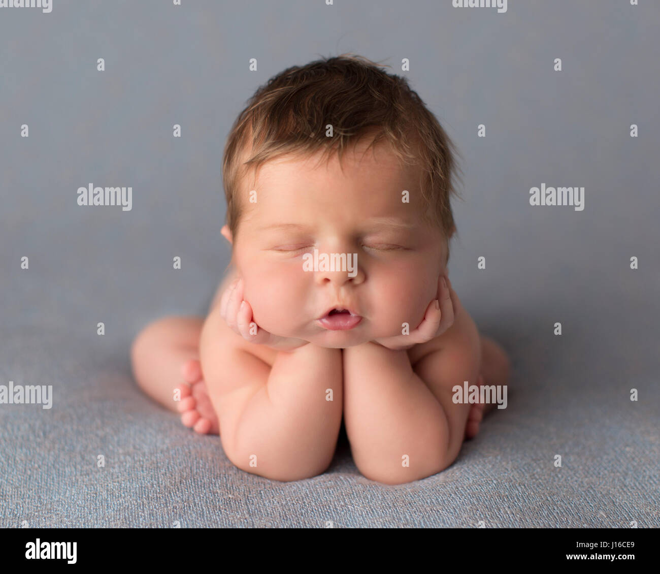 The Pensive Funny Baby Poses At Home Stock Photo, Picture and Royalty Free  Image. Image 7754632.