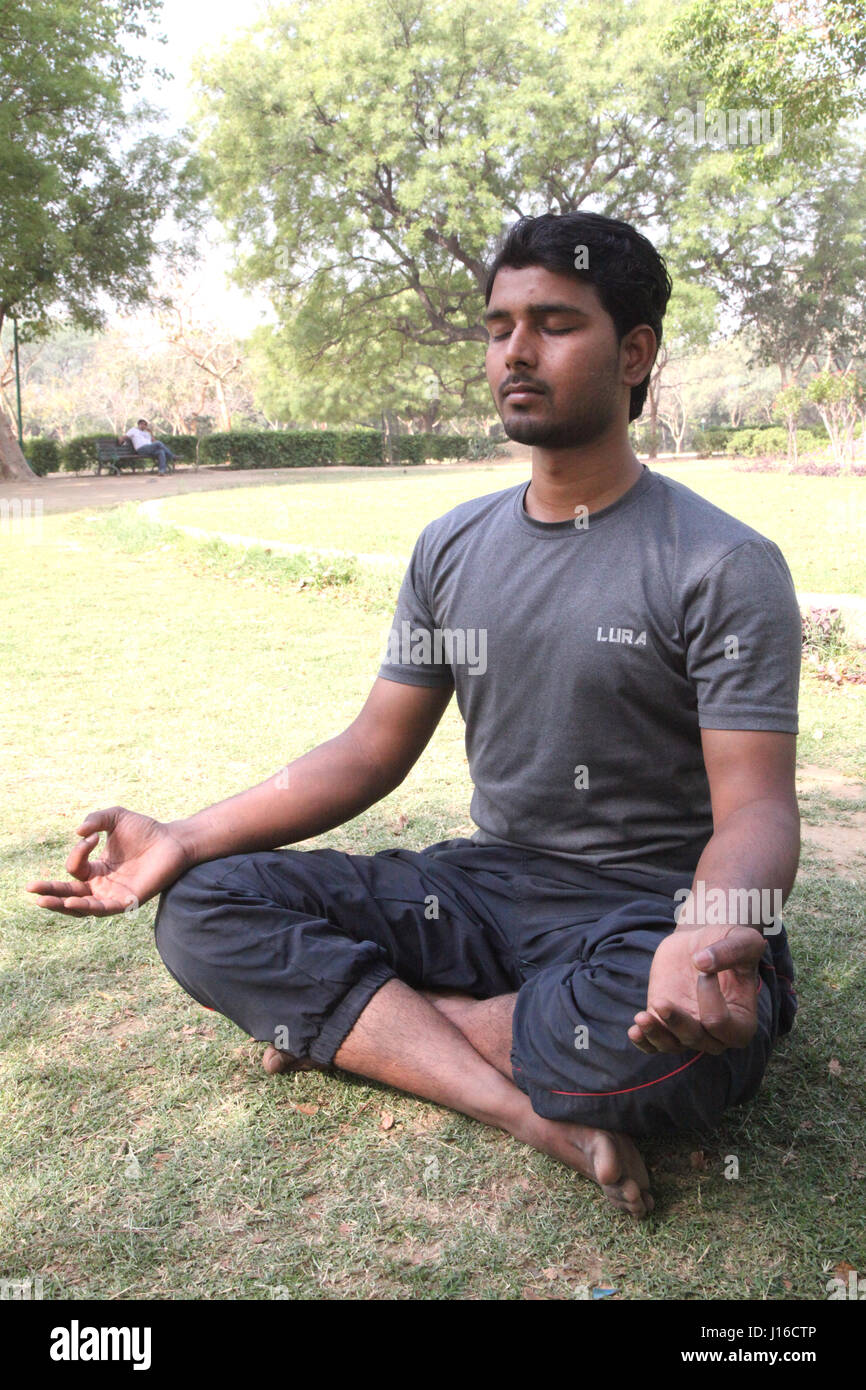 Take a Moment With Meditation, Childrens Park, Meditation, Yoga, Morning Garden, New Delhi, India, (Photo Copyright © by Saji Maramon) Stock Photo