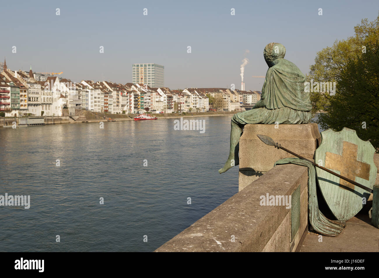 A photograph of the Helvetia staue on the Rhine river in Basel, Switzerland, taken on a sunny day in spring. Stock Photo