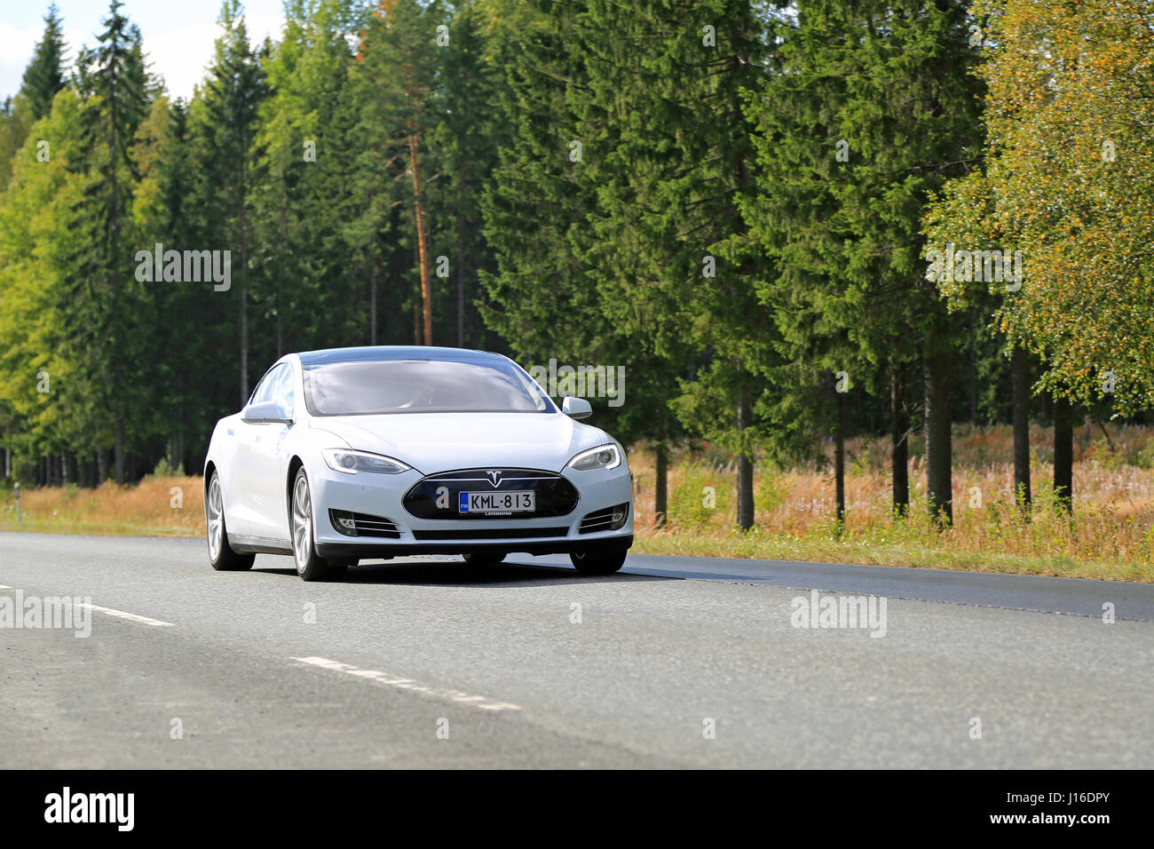 HUMPPILA, FINLAND - SEPTEMBER 12, 2015: Tesla Model S electric car on the road. Tesla’s autopilot technology is close to getting a key update. Stock Photo