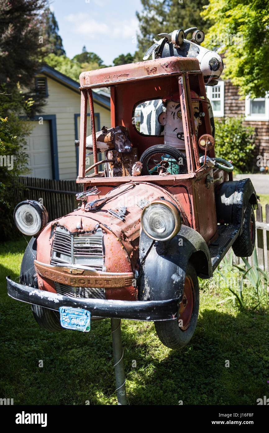 Florence Avenue, Sebastapol, Calfornia. The residents here have embraced the 'junk art' by Patrick Amiot by putting them in their gardens. Stock Photo