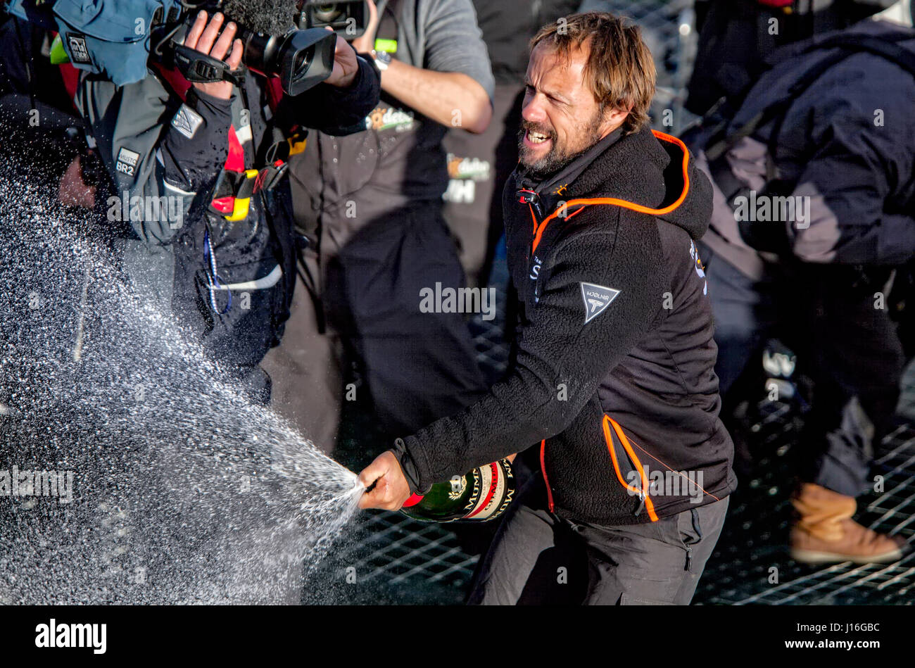 Thomas Coville Successfully Broken The Solo Round The World Record Spraying Champagne, Brest, France Stock Photo
