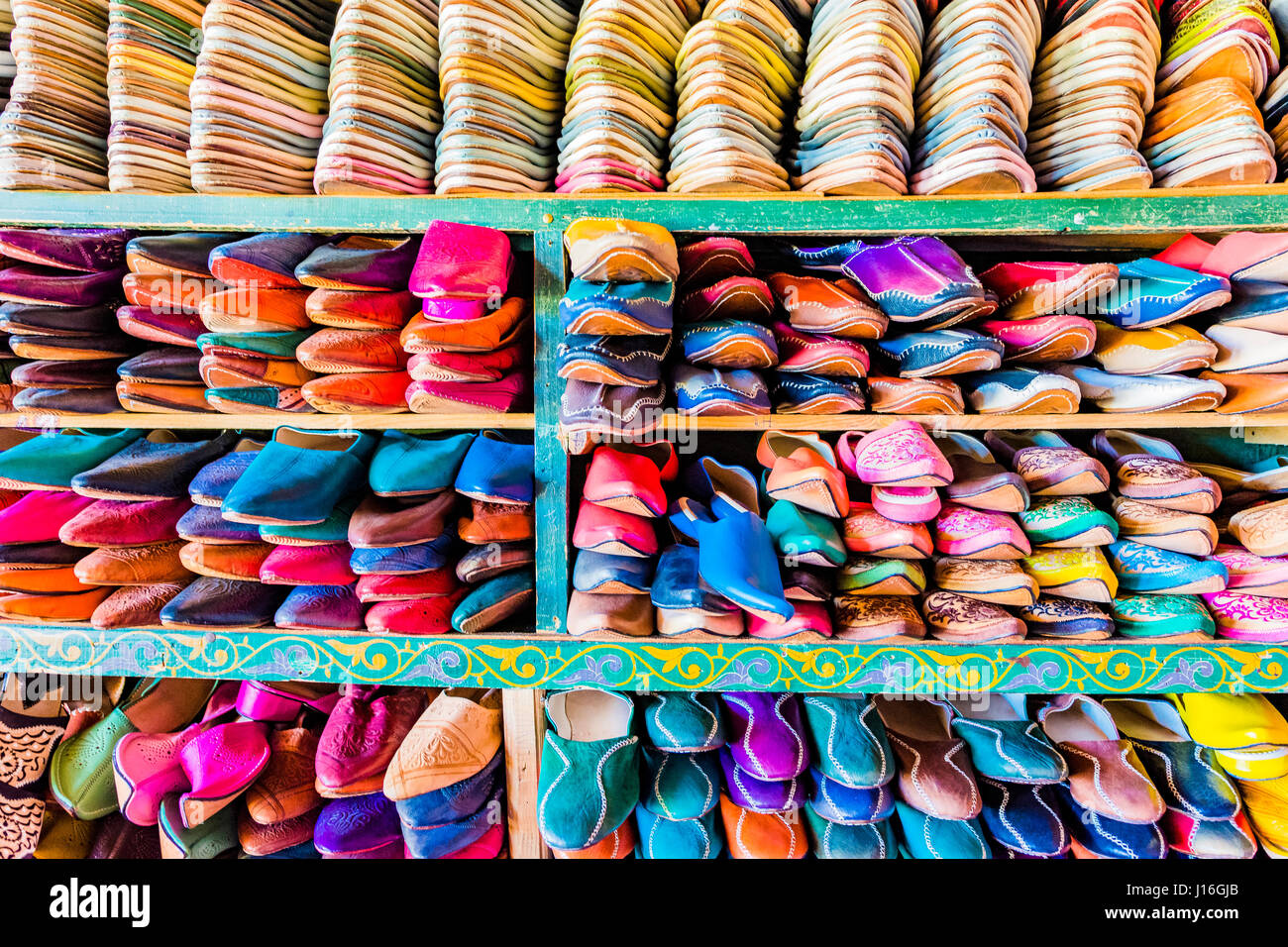 Slippers stacked and for sale in a shop in the medina at Fes, Morocco, North Africa Stock Photo