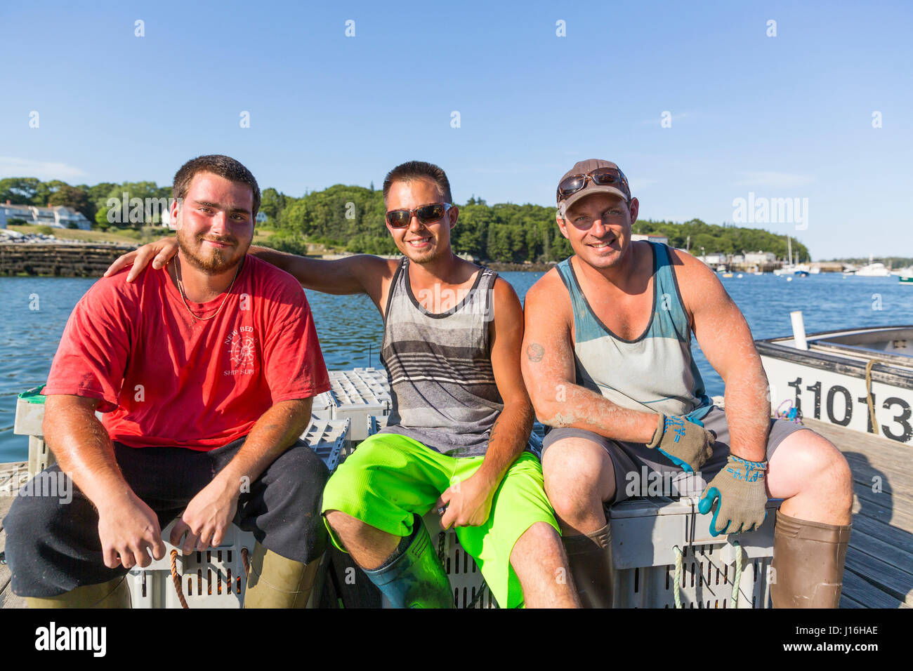 Sternman With Captain On The Dock At The Tenants Harbor Fisherman's Coop In Tenants Harbor, Maine Stock Photo