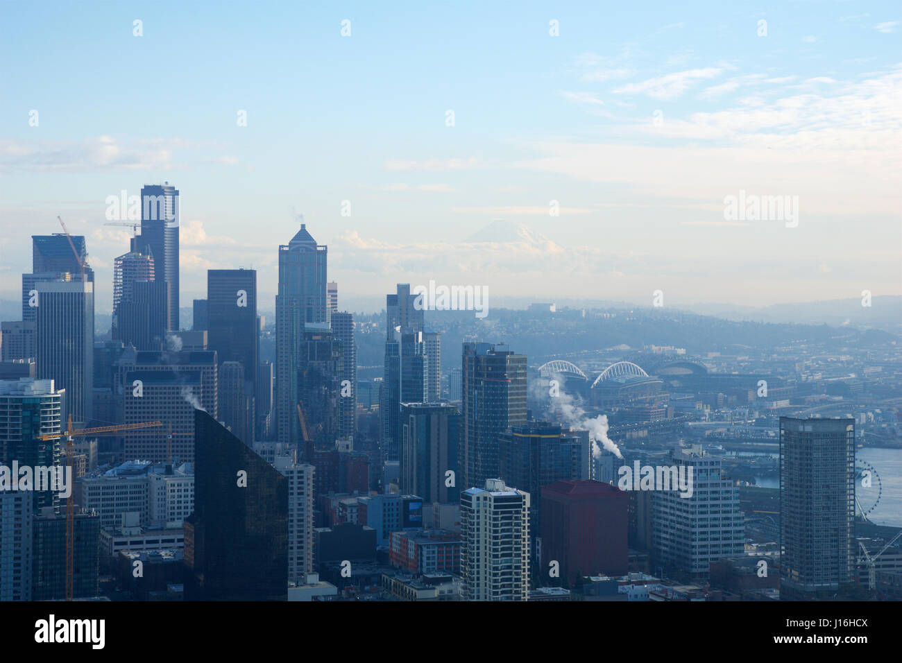 SEATTLE, WASHINGTON, USA - JAN 23rd, 2017: skyline of downtown Seattle, view from the top of the Space Needle during a cloudy day Stock Photo