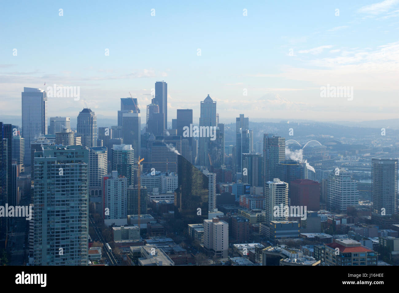 SEATTLE, WASHINGTON, USA - JAN 23rd, 2017: skyline of downtown Seattle, view from the top of the Space Needle during a cloudy day Stock Photo