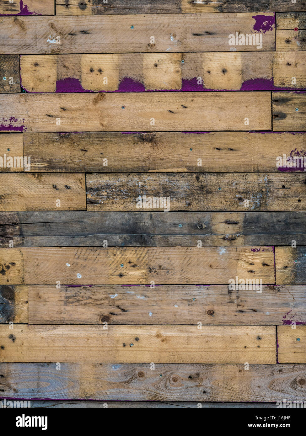 Old wooden pallet wood fastened to wall Stock Photo