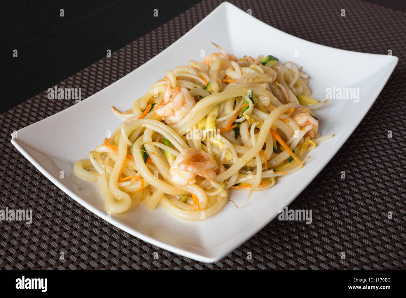 delicious japanese food yaki udon, noodles with seafood,shrips and
