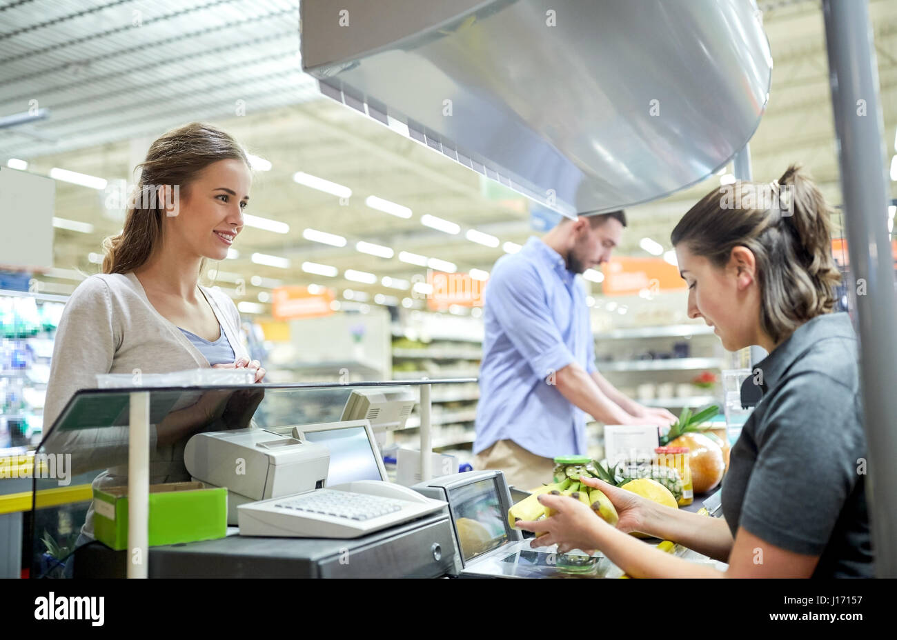 Grocery store cashier hires stock photography and images Alamy