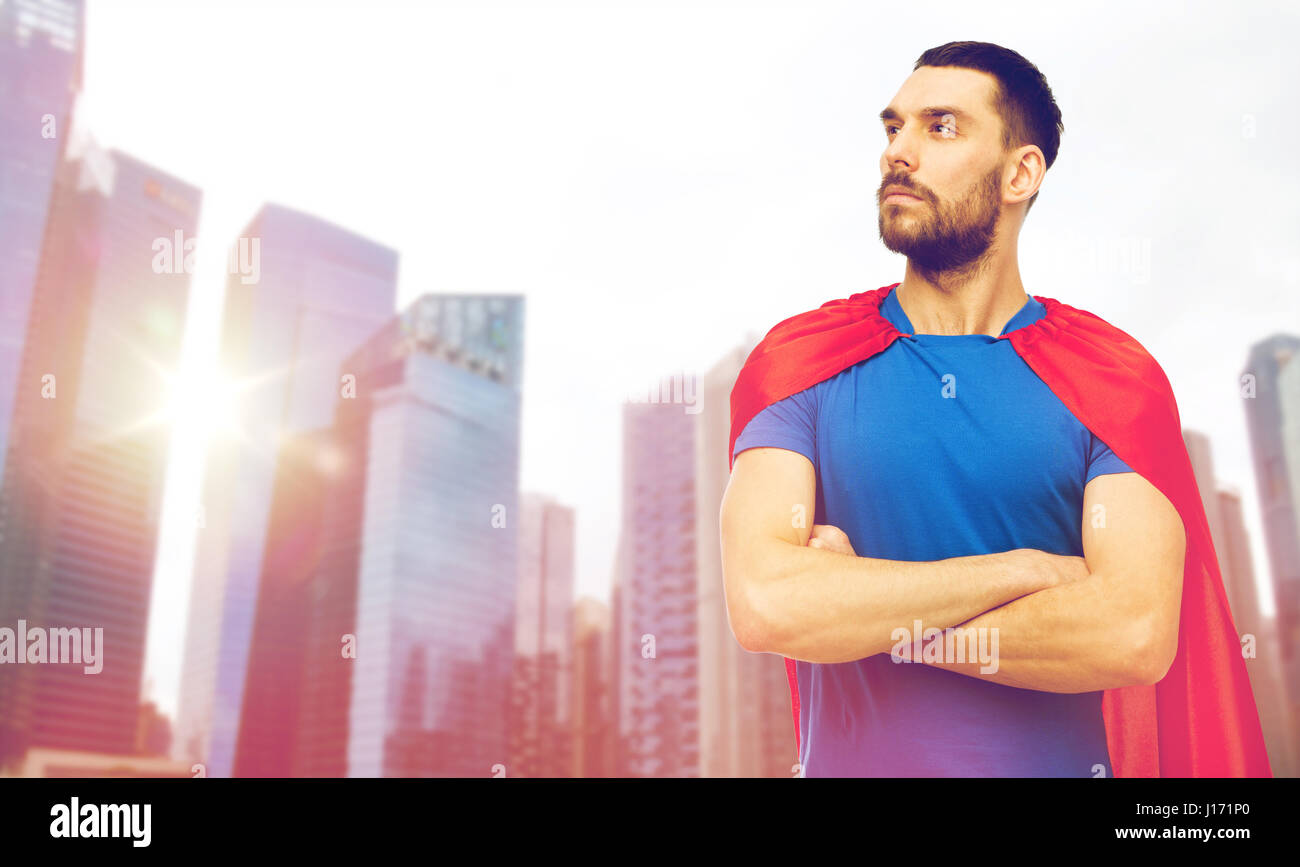 man in red superhero cape over city skyscrapers Stock Photo - Alamy