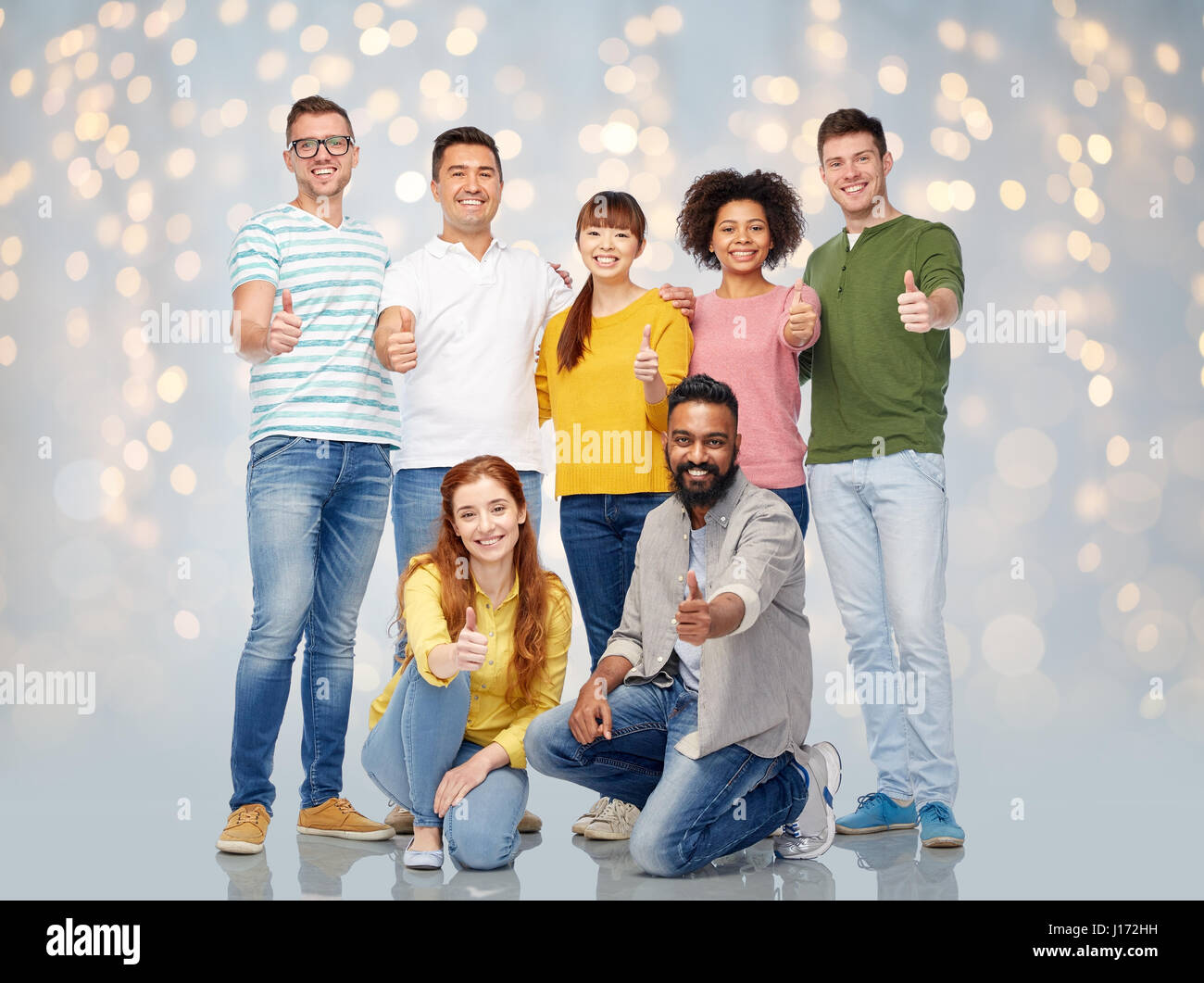 international group of people showing thumbs up Stock Photo - Alamy