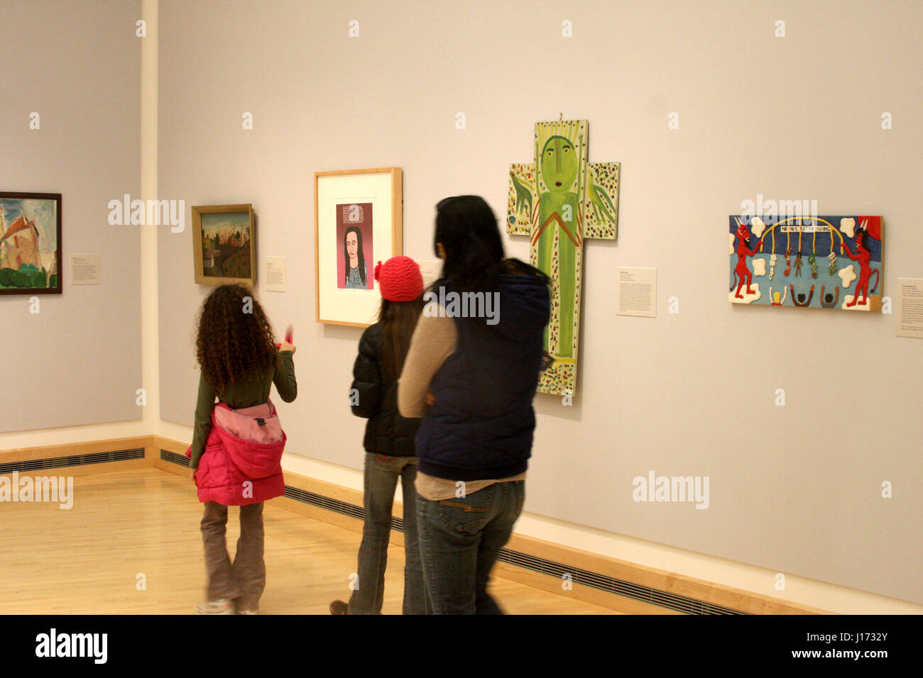 Mother and children visiting art museum/ gallery Stock Photo - Alamy