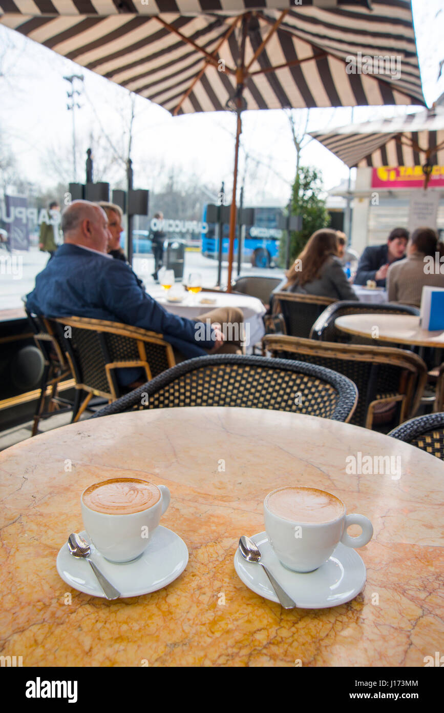 Two cups of coffee in a terrace. Independencia Square, Madrid, Spain