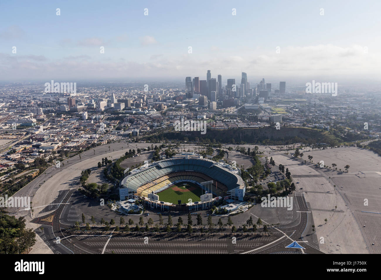 Los Angeles, California, USA - April 12, 2017:  Aerial view of the historic Dodger Stadium with downtown in background. Stock Photo