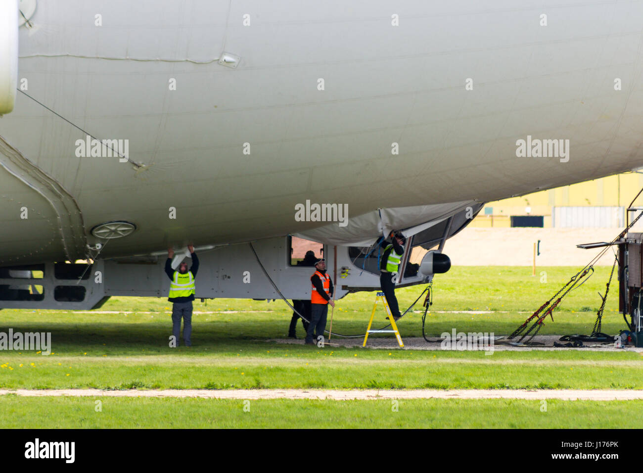 Cardington, UK. 18th Apr, 2017. The Hybrid Air Vehicles Airlander 10 is moored to the new Mobile Mooring Mast as engineers and ground crew check the Auxiliary Landing System (ALS), which has been added to allow the aircraft to land safely at a greater range of landing angles.. The aircraft is almost ready to begin it's 2017 flight test programme. Photo Credit: Mick Flynn/Alamy Live News Stock Photo