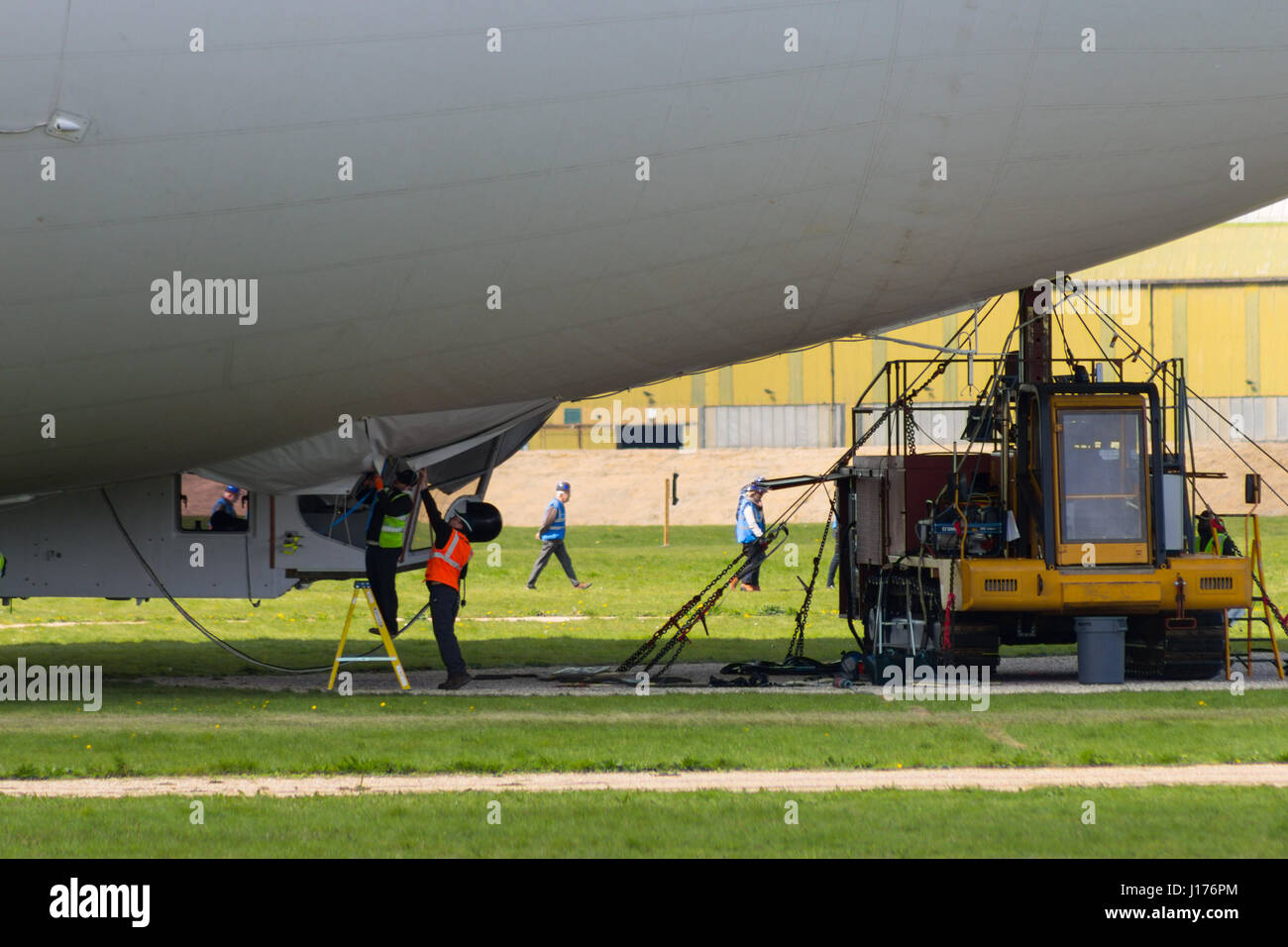 Cardington, UK. 18th Apr, 2017. The Hybrid Air Vehicles Airlander 10 is moored to the new Mobile Mooring Mast as engineers and ground crew check the Auxiliary Landing System (ALS), which has been added to allow the aircraft to land safely at a greater range of landing angles.. The aircraft is almost ready to begin it's 2017 flight test programme. Photo Credit: Mick Flynn/Alamy Live News Stock Photo