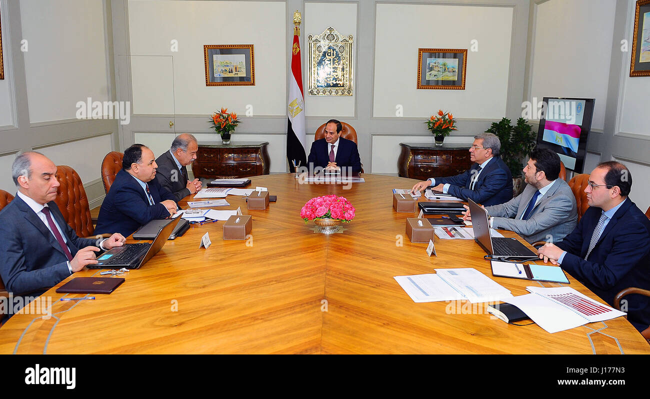 Cairo, Egypt. 18th Apr, 2017. Egyptian President Abdel Fattah al-Sisi meets with Sherif Ismail Prime Minister, and Minister of Finance Amr El Garhy in Cairo, Egypt, on April 18, 2017 Credit: Egyptian President Office/APA Images/ZUMA Wire/Alamy Live News Stock Photo