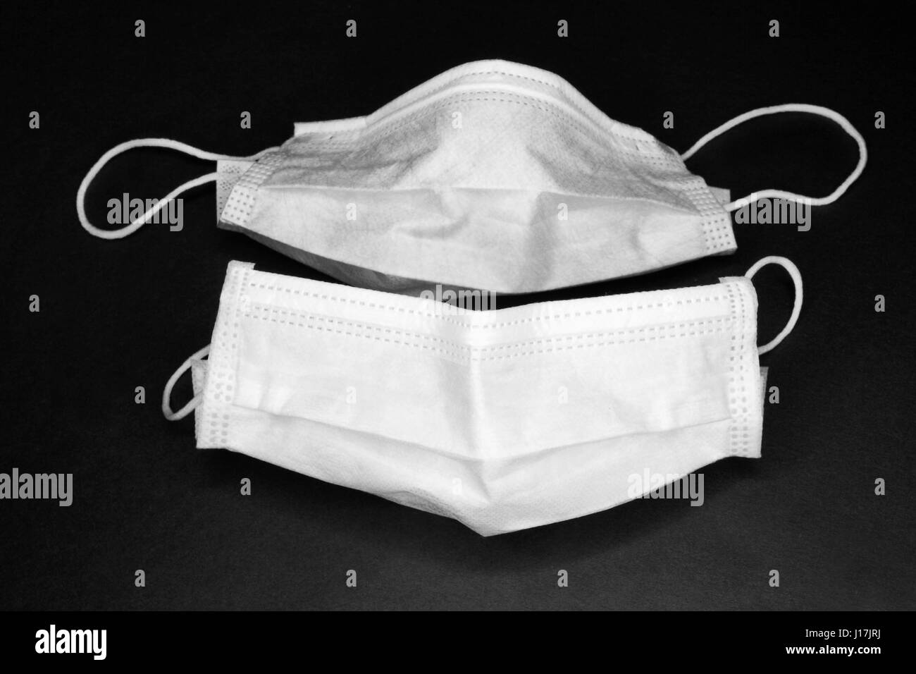 Two medical masks, black and white photo Stock Photo