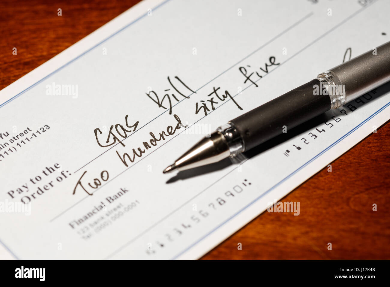 Fake cheque,  cheque for Natural Gas Bill, financial concept. Stock Photo