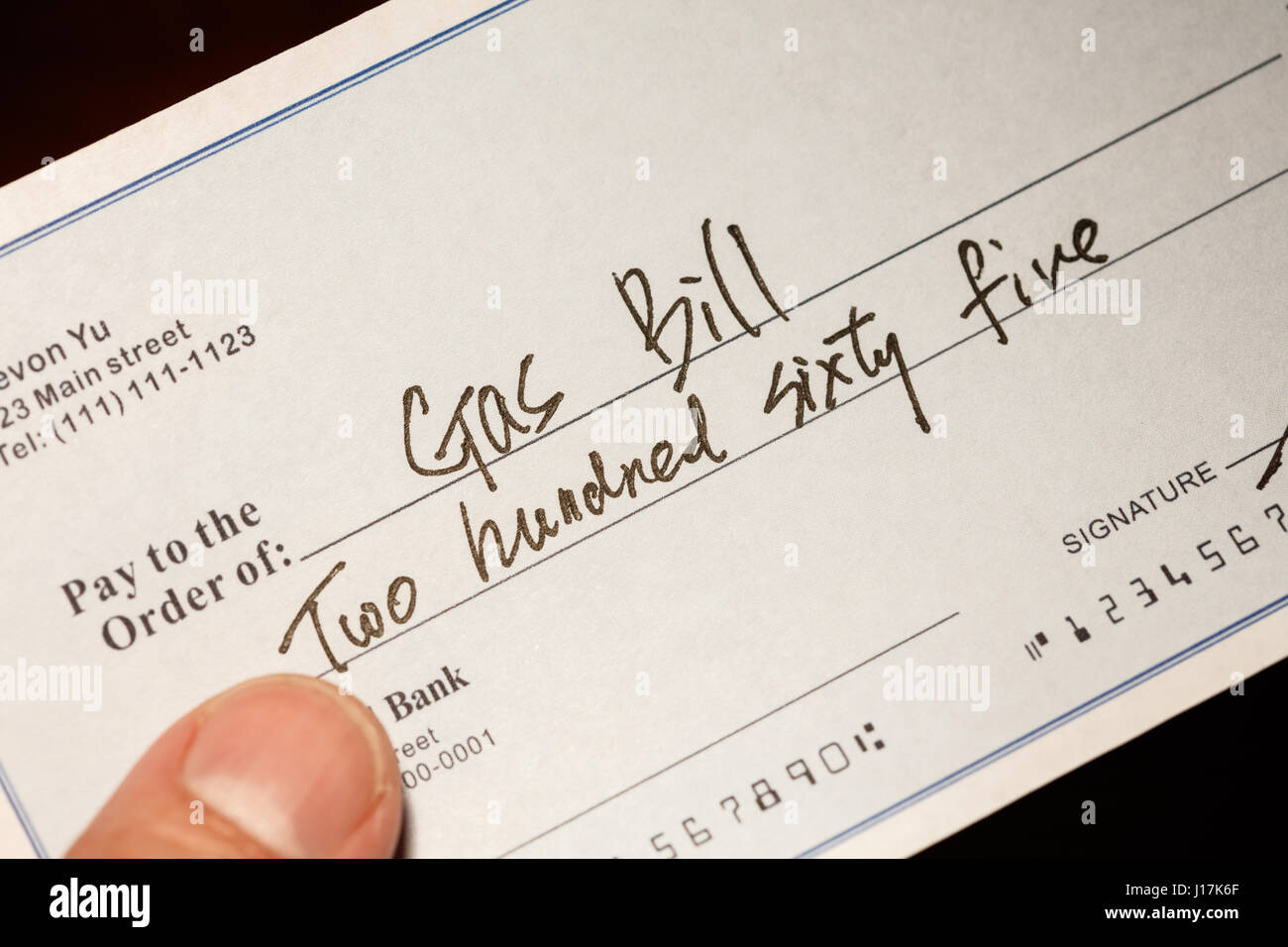 Fake cheque,  cheque for Natural Gas Bill, financial concept. Stock Photo