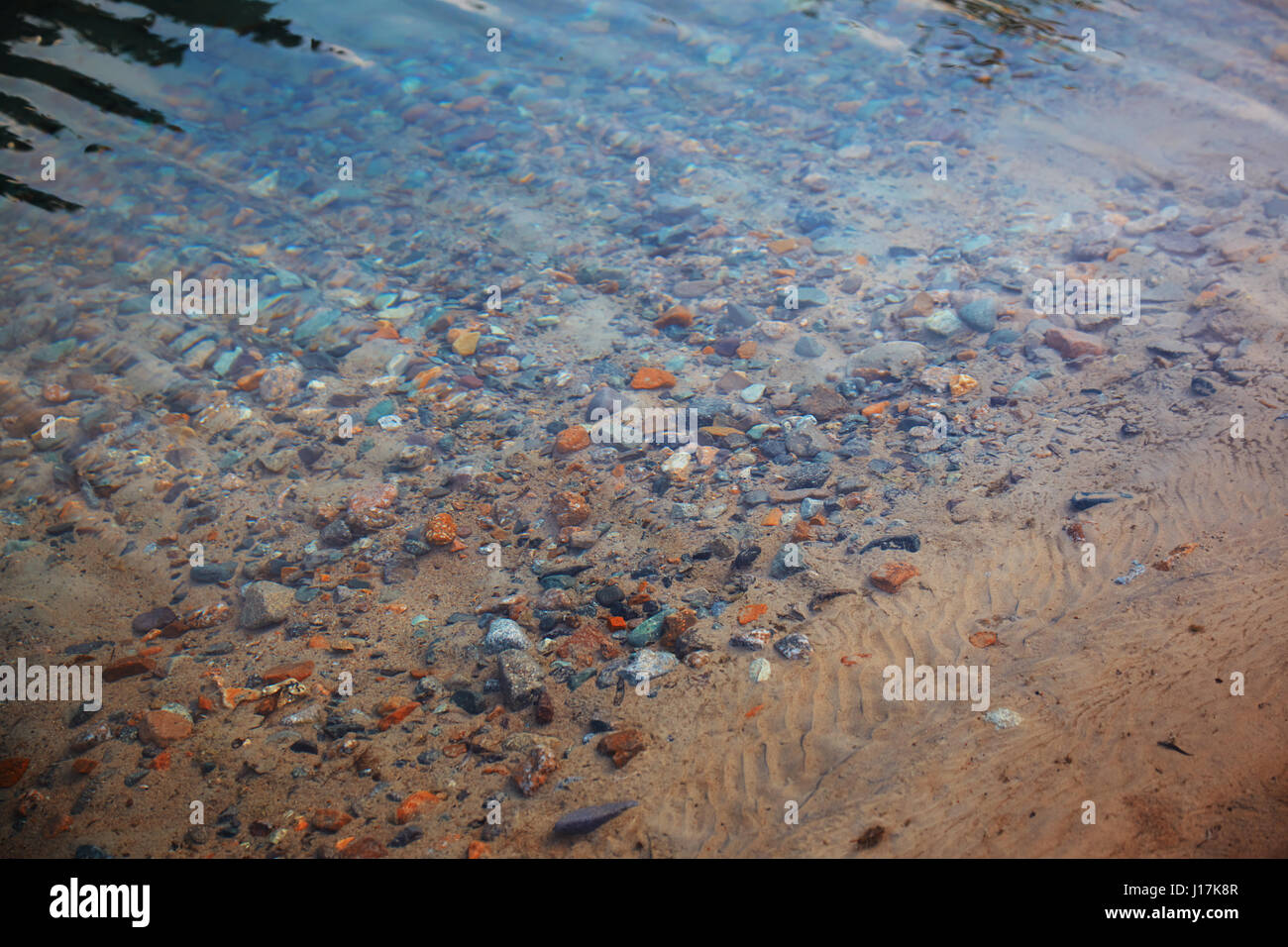 Underwater pebbles in the river. Close-up photo Stock Photo - Alamy