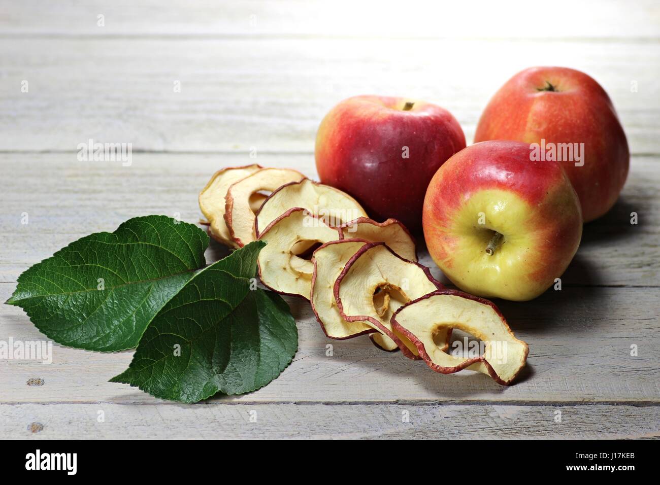 homemade dried apple rings on wooden background Stock Photo Alamy