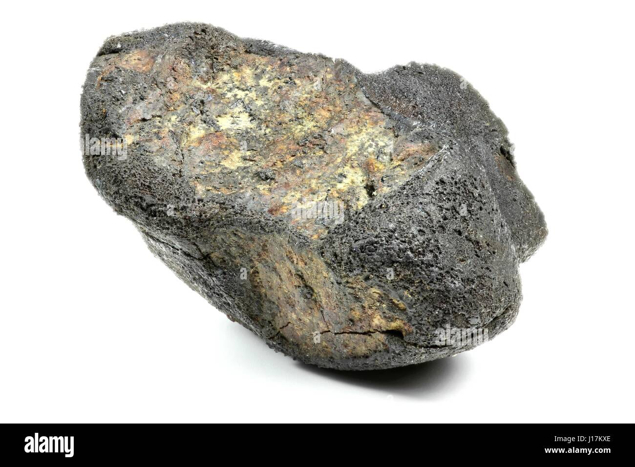 fragment of the Chelyabinsk meteorite (fallen 15 February 2013) isolated on white background Stock Photo