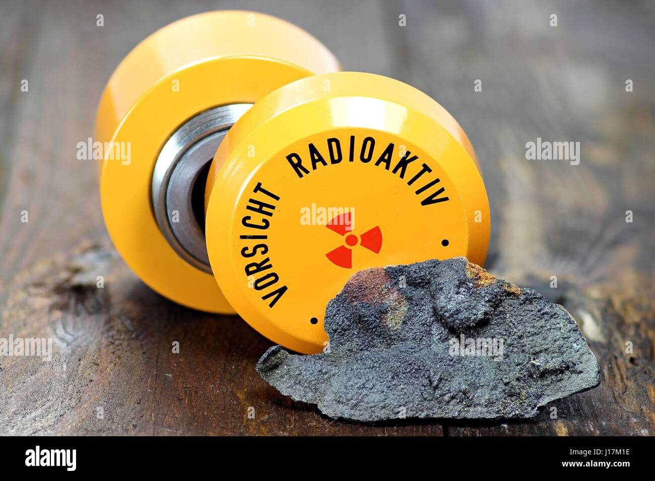 uraninite with storage container for radioactive materials Stock Photo