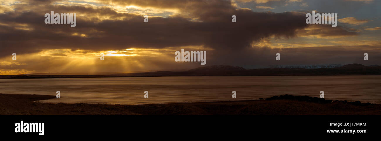 Light rays over the River Varma in Iceland Stock Photo