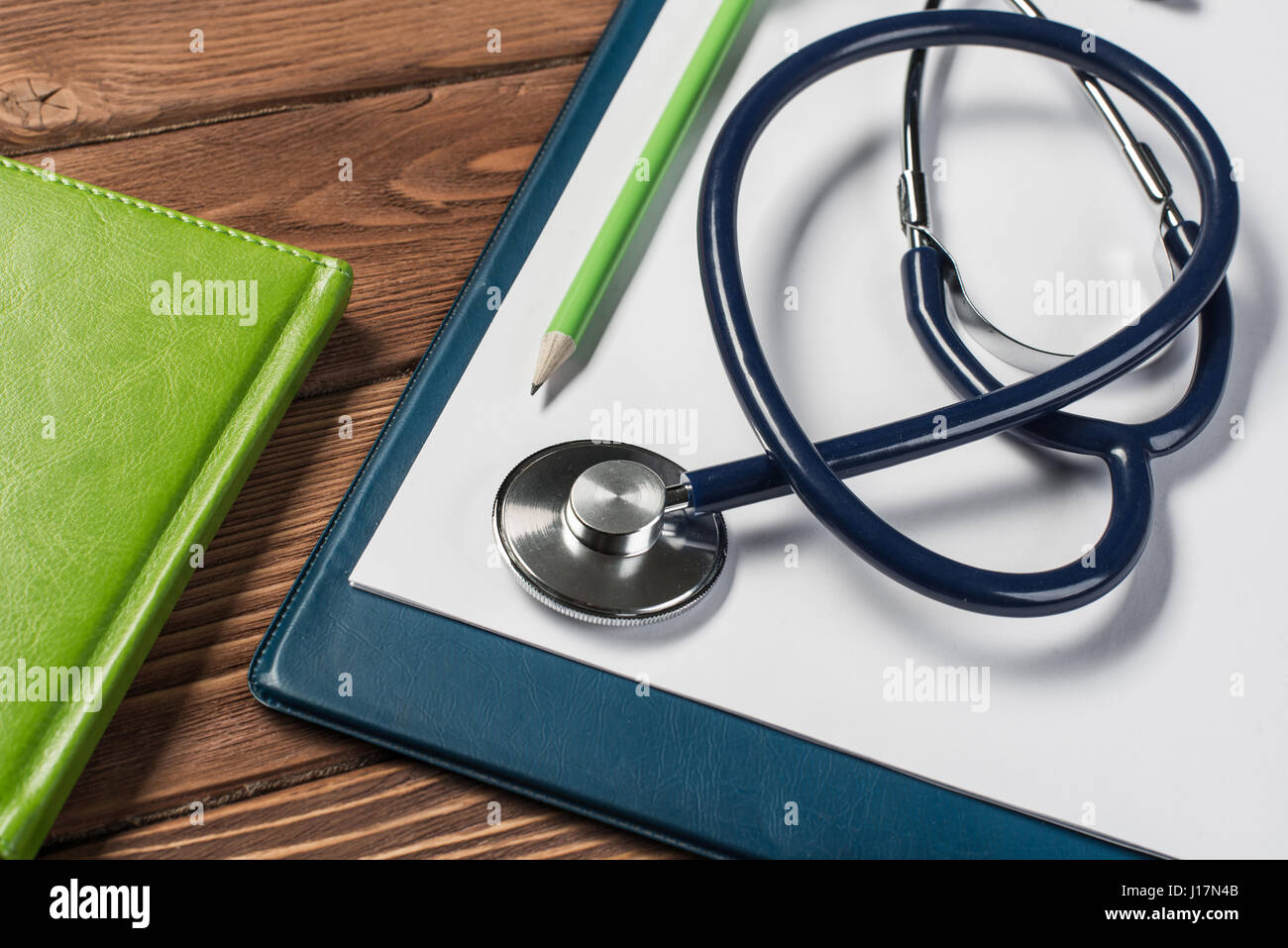 Desk of doctor with medicine things Stock Photo - Alamy