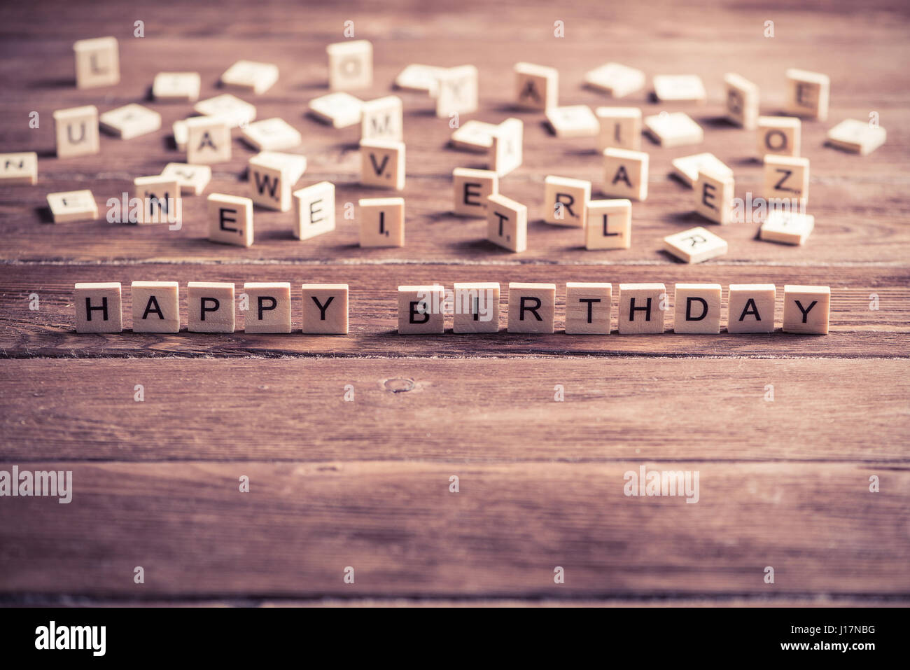 wooden elements with letter collected to word happy birthday Stock