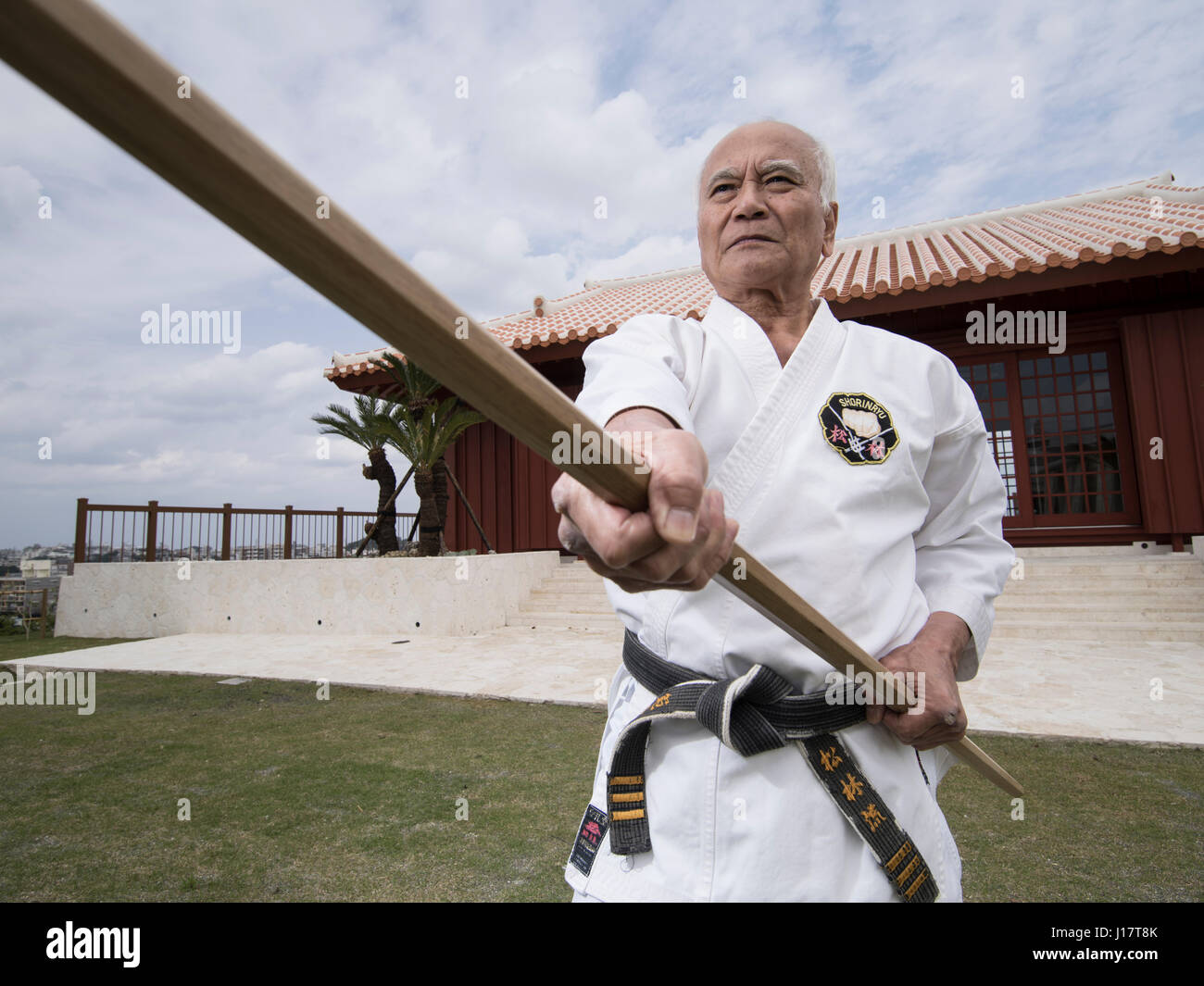Karate master Arakaki sensei at the 100 Kobudo Kata Event at Karate Kaikan, Okinawa, Japan Stock Photo
