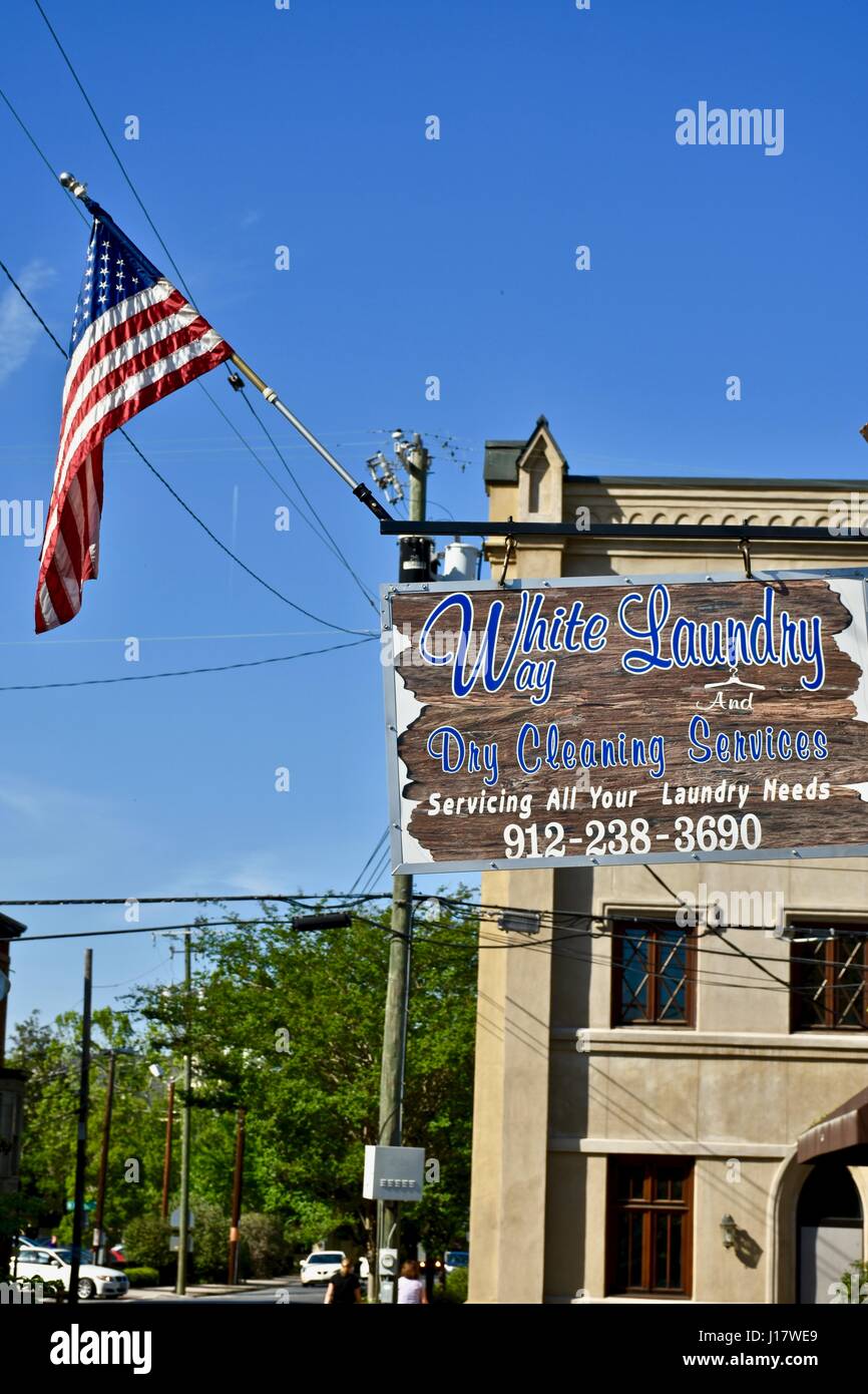 White laundry dry cleaning services sign Savannah, Stock Photo