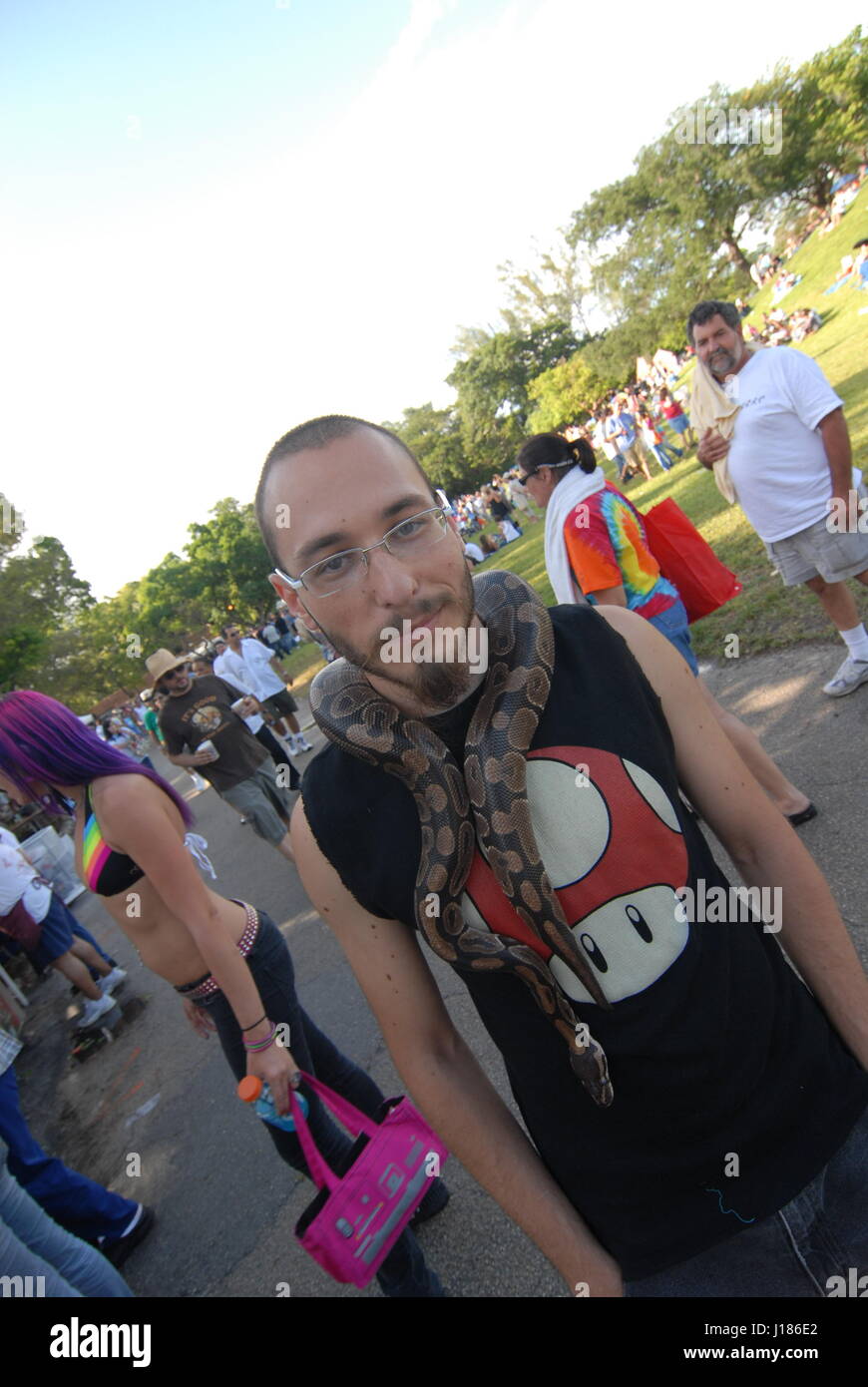 hippy festival love in Miami Florida USA people dressed as 1960's
