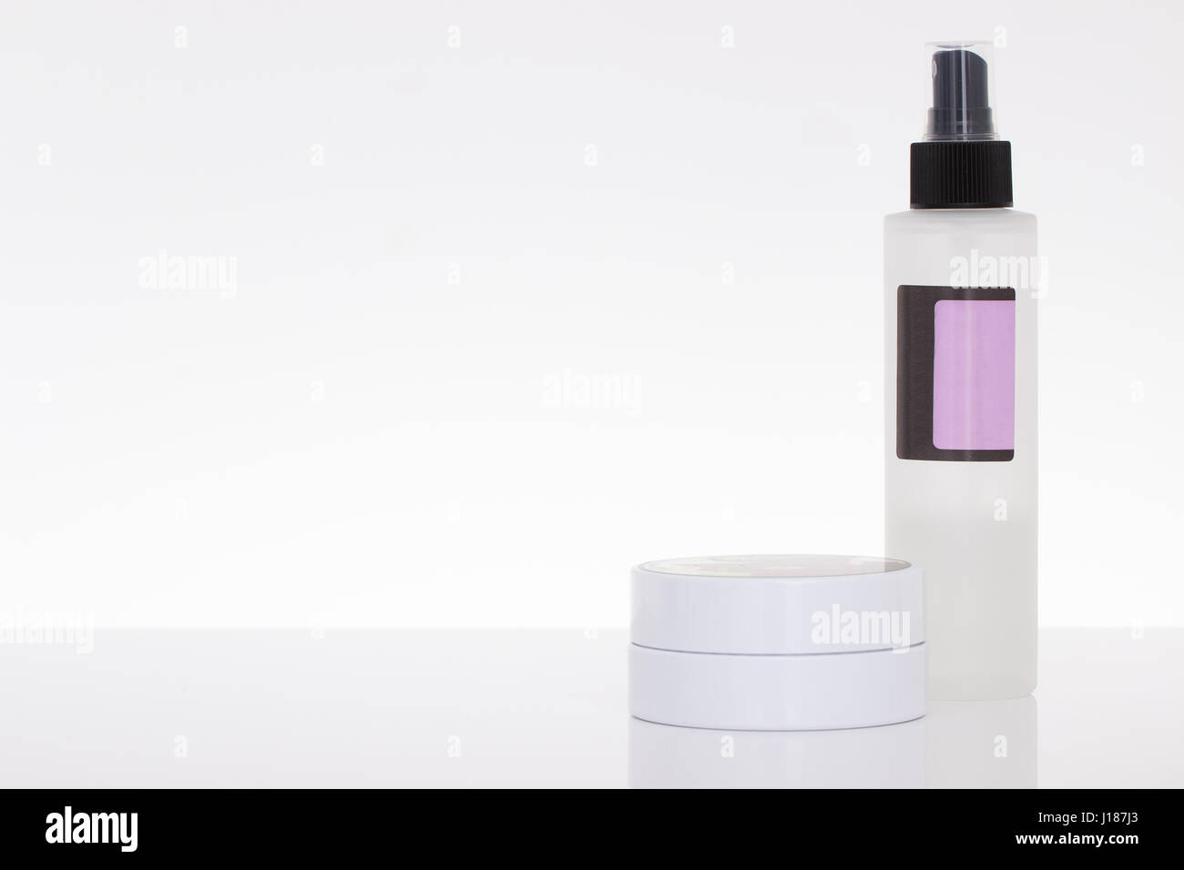 cosmetic containers isolated Stock Photo - Alamy